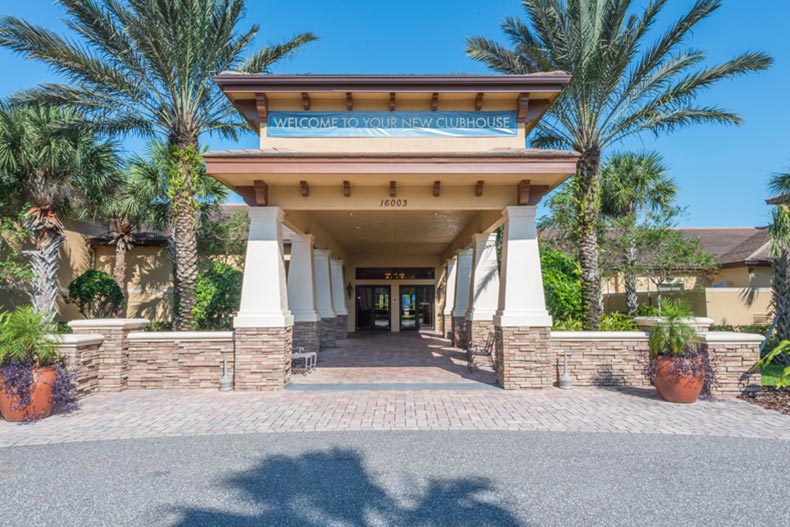 Exterior view of the clubhouse entrance at Valencia Lakes in Wimauma, Florida