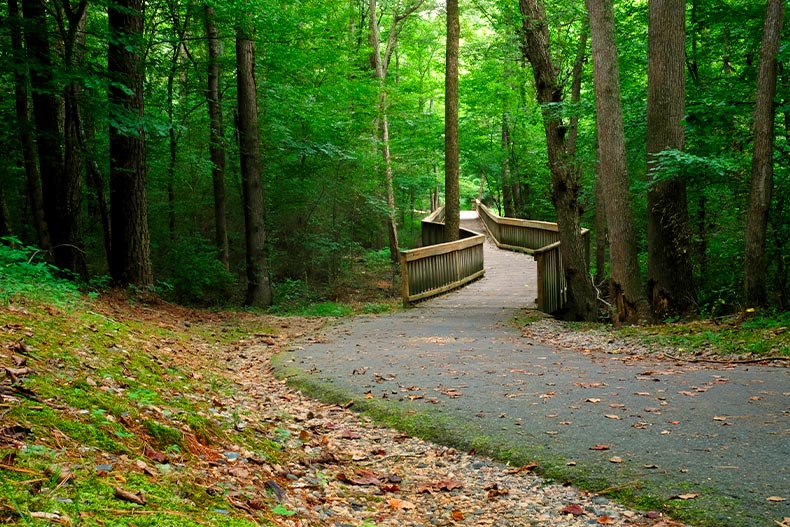 A wooden footbridge along Walnut Creek Trail in Raleigh, North Carolina