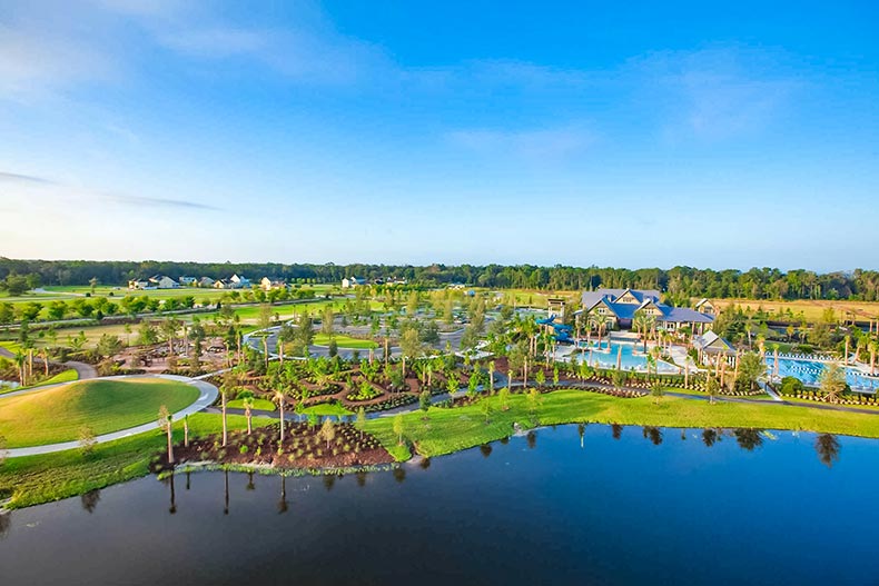 Aerial view of WaterSong at RiverTown from over the lake in St Johns, Florida