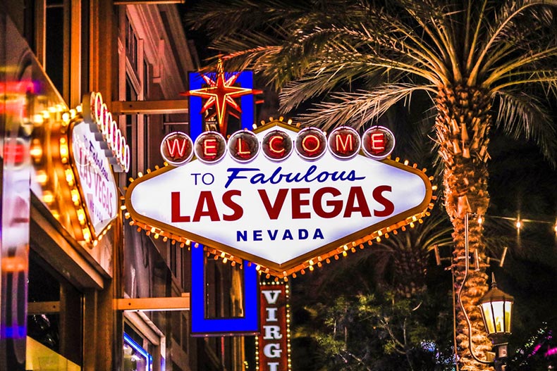 "Welcome to Fabulous Las Vegas Nevada" sign on a downtown street at night in Las Vegas, Nevada