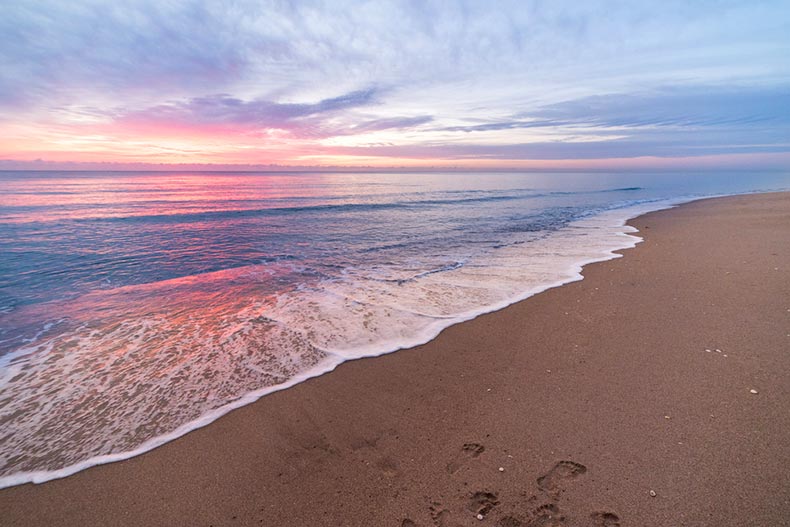 Sunrise over the ocean by the pier at West Palm Beach, Florida