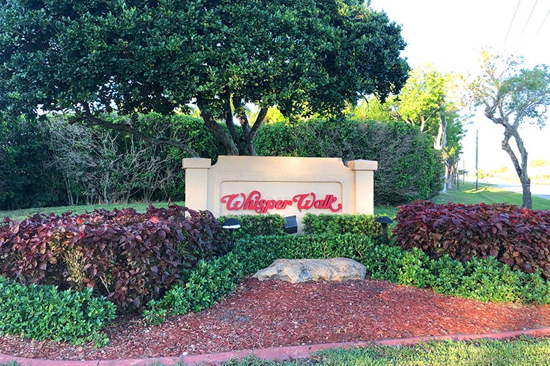 The community sign for Whisper Walk in Boca Raton, Florida