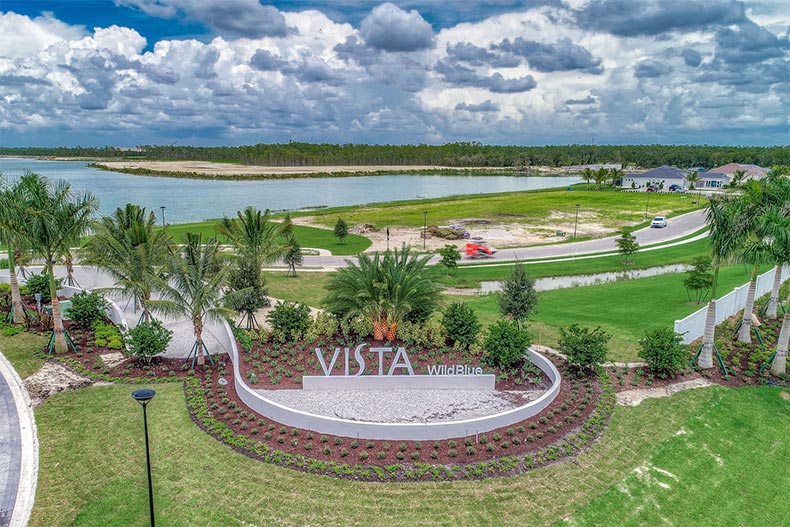 Aerial view of the community entrance at WildBlue in Estero, Florida