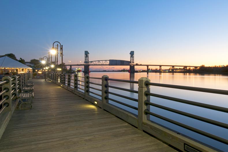 A sunset over a pier in Wilmington, North Carolina