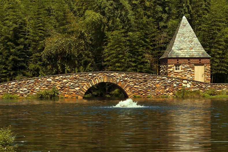  A stone footbridge over a lake in Winston-Salem, North Carolina
