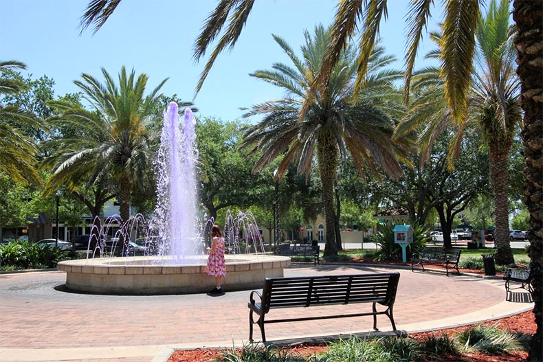 Palm trees surrounding the fountain in the town square of Winter Haven, Florida