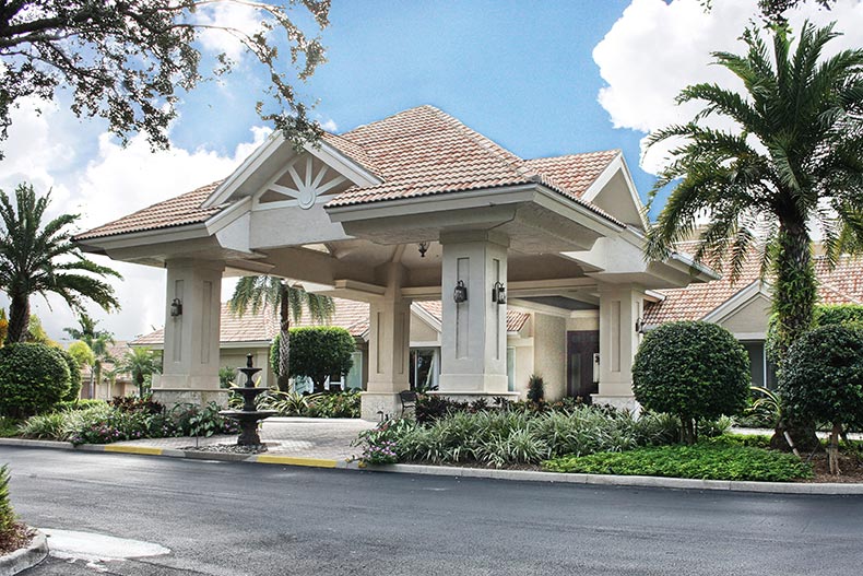 Exterior view of the clubhouse entrance at Worthington Country Club in Bonita Springs, Florida
